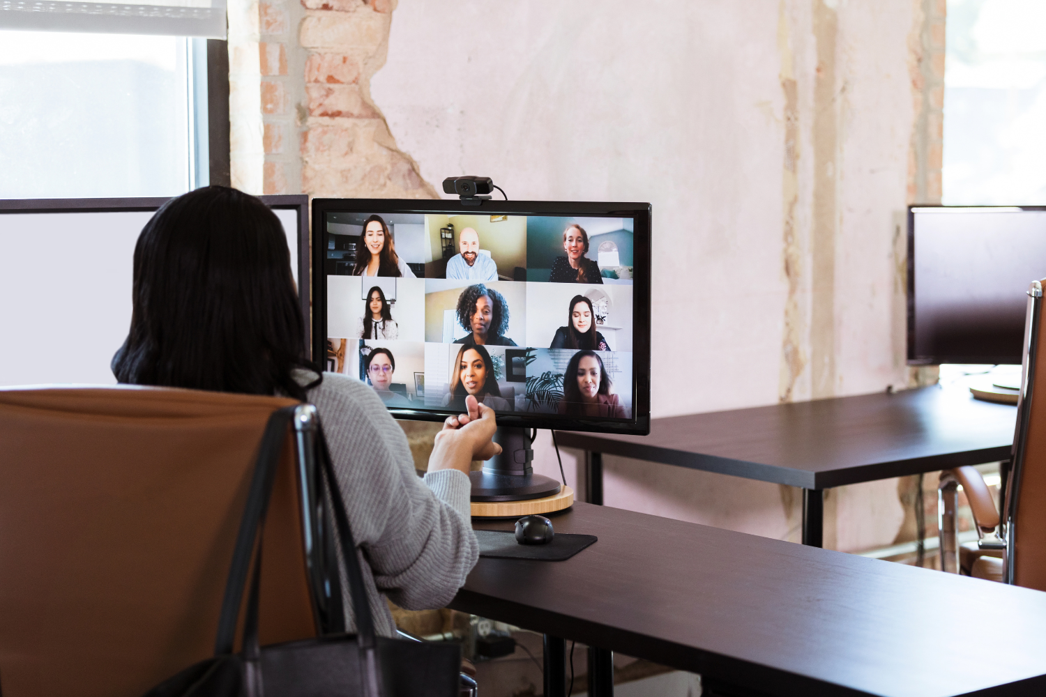 Virtual worker working through video conference.