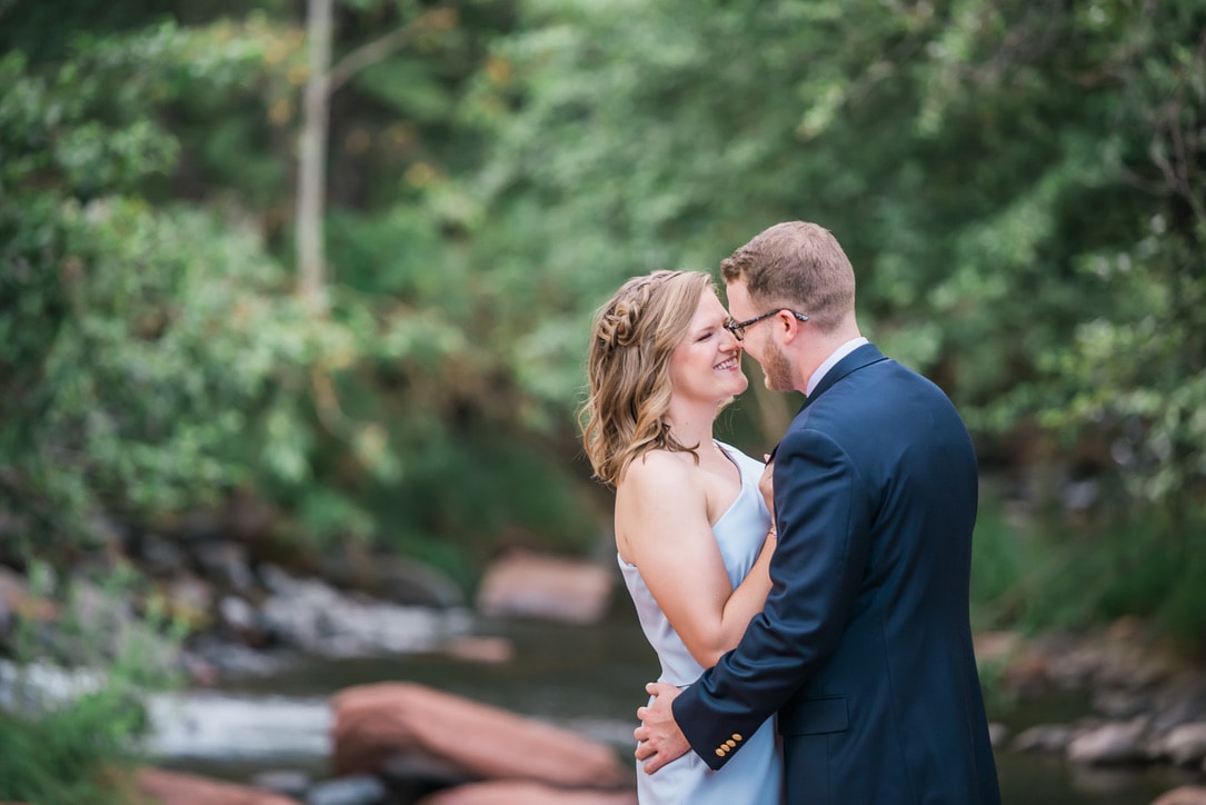 A photographer in Arizona capturing an engagement session in Sedona at L' Auberge Resort