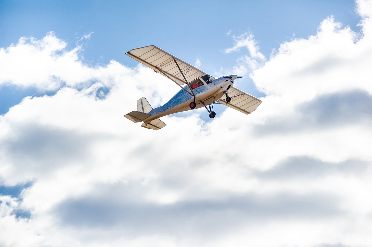 A student pilot flying solo for the first time during their flight training journey.