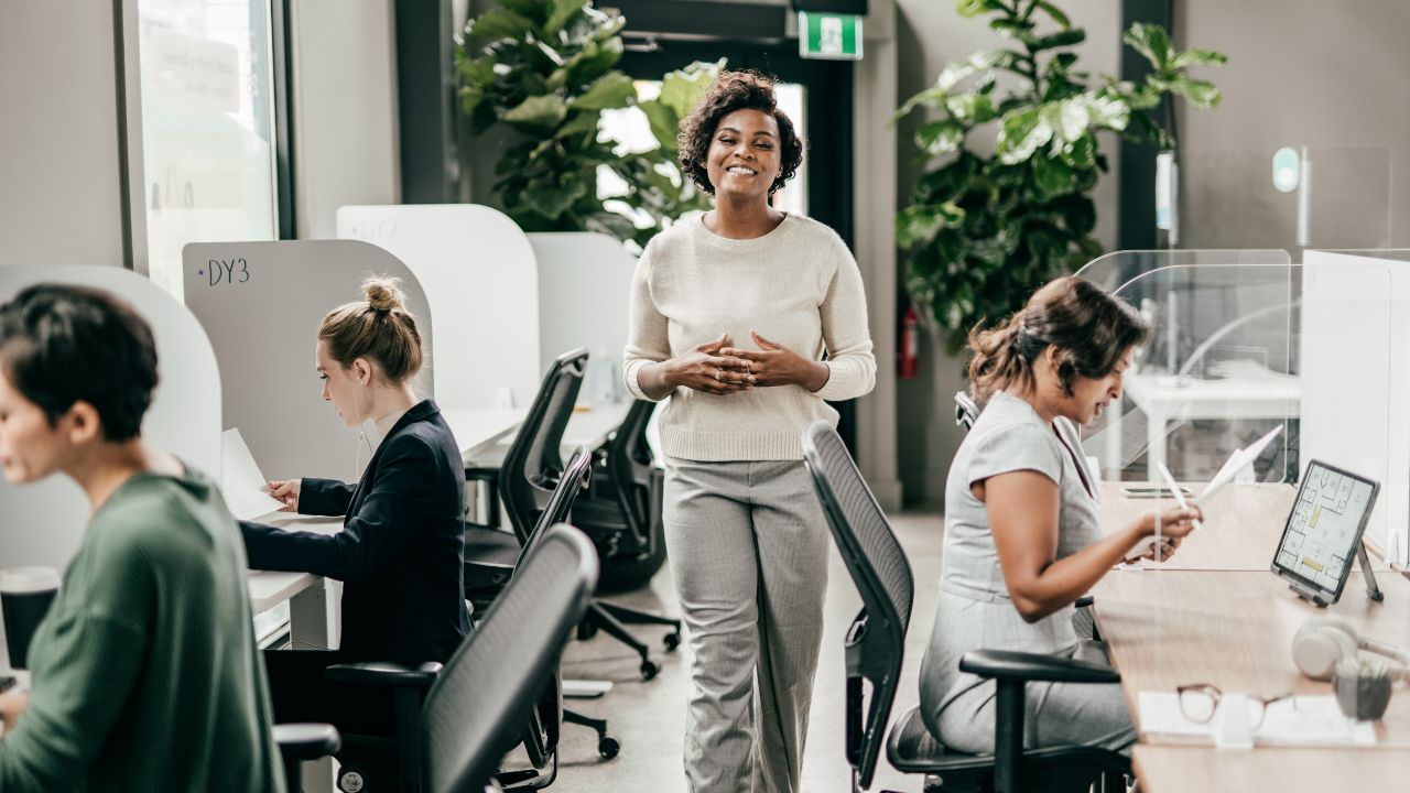 A person monitoring performance and scaling their business