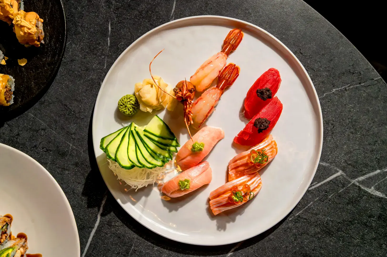 Sushi Sato Singapore premium sushi platter featuring salmon, tuna, prawns, ikura and assorted Japanese nigiri