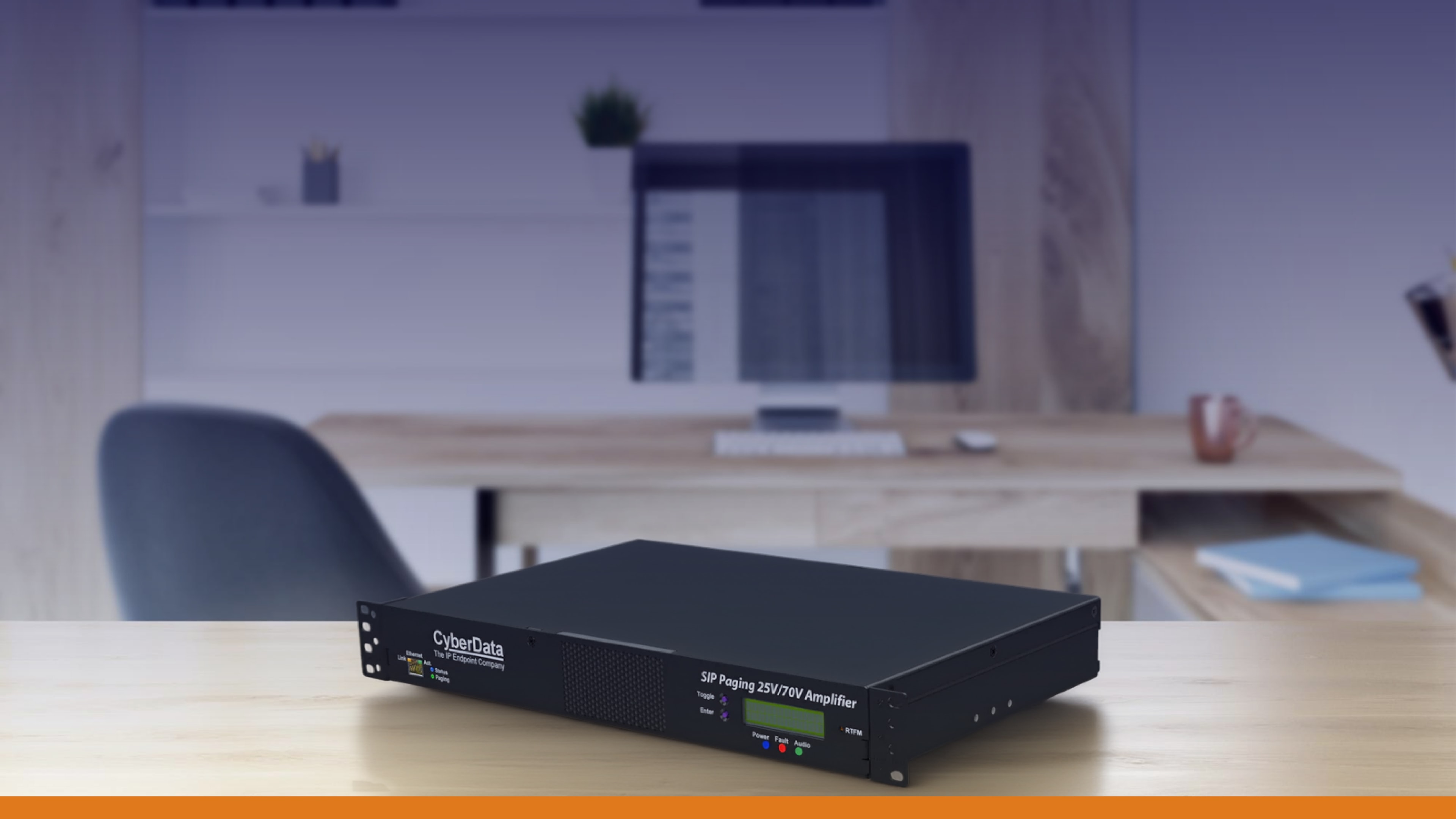 CyberData SIP Paging Amplifier device on a desk, supporting state and local governments in enhancing public safety communications.