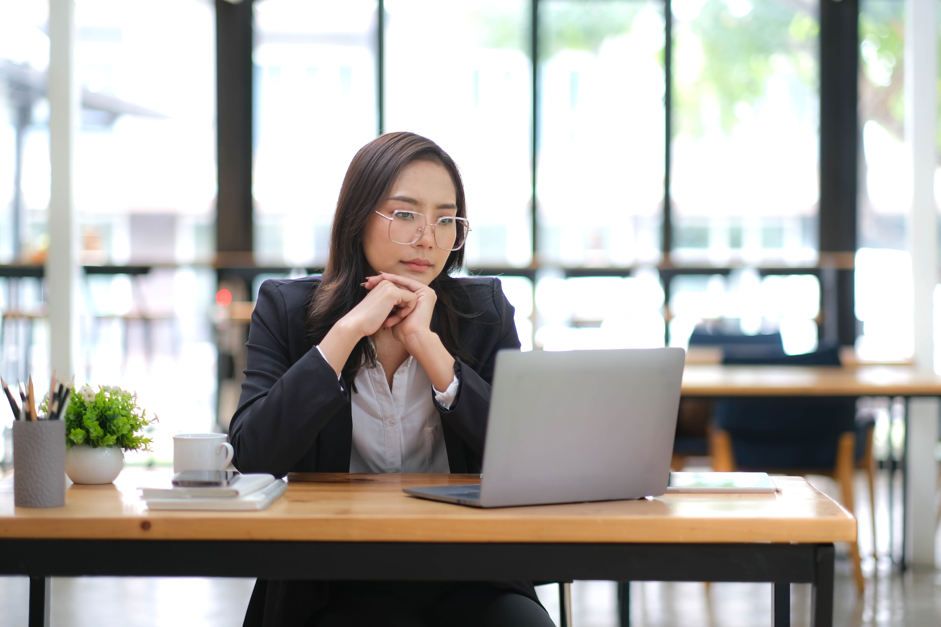 Business woman thinking