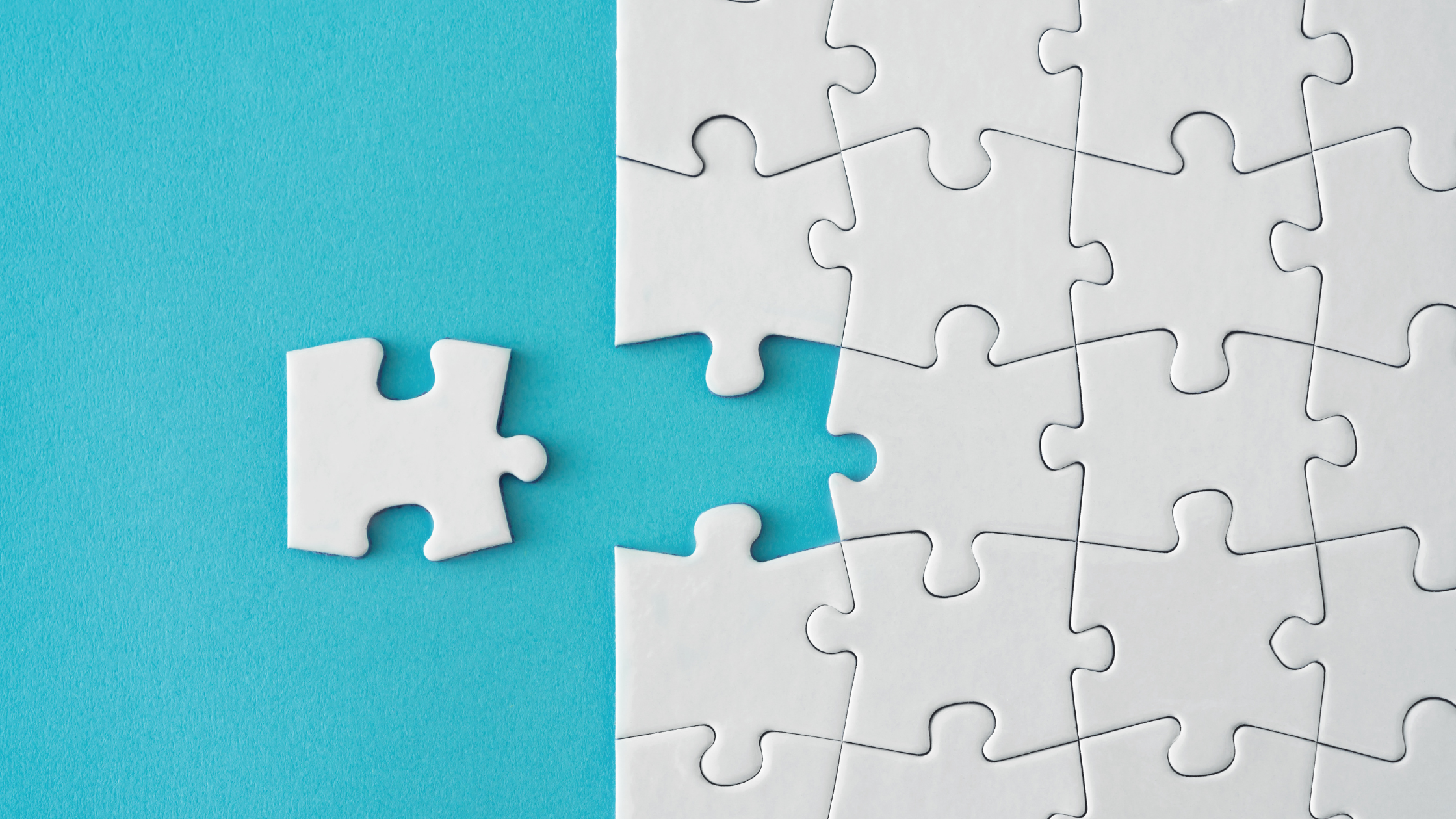 White puzzle piece fitting into a larger puzzle, representing integration with existing tools like CRMs, Google Workspace, and file sharing platforms.