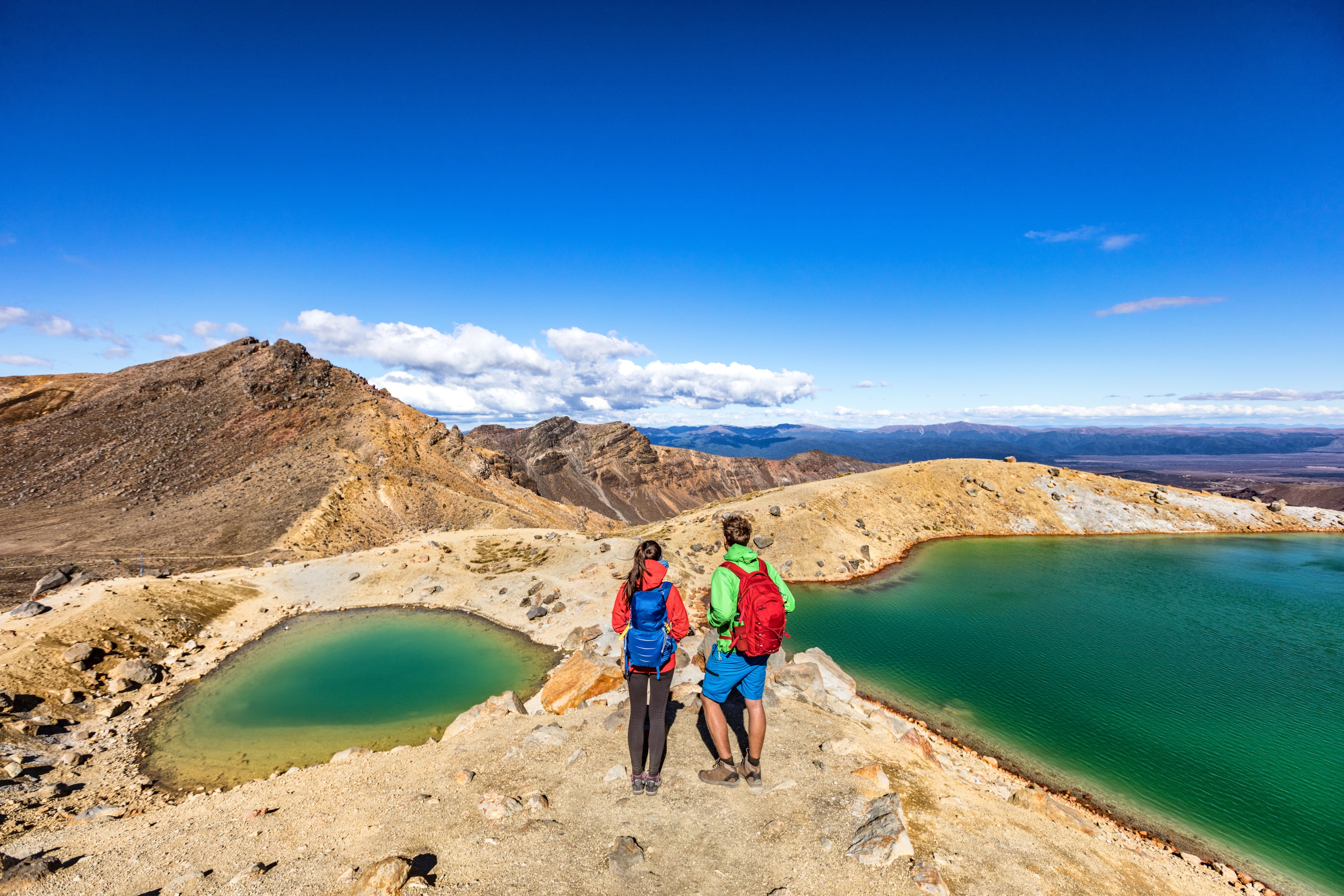 A couple hiking Tongariro Alpine Crossing