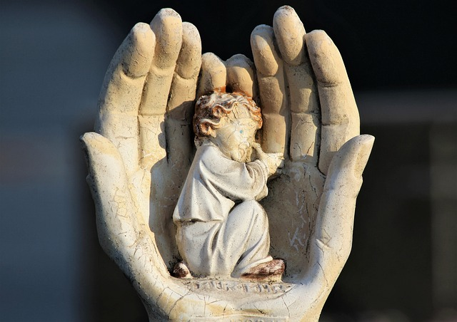 little angel, resting in hands, figure