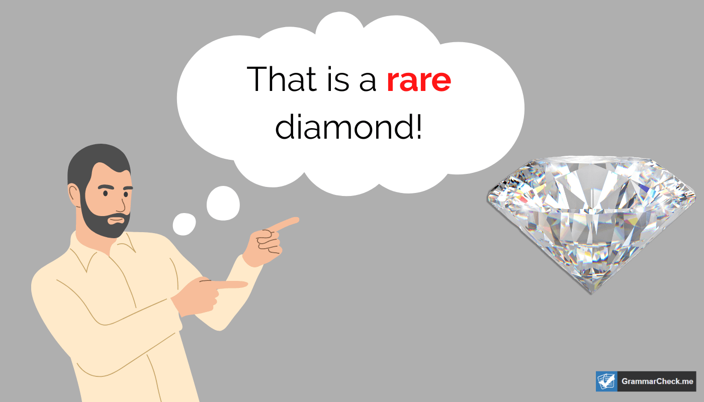 man pointing at a rare diamond next to him