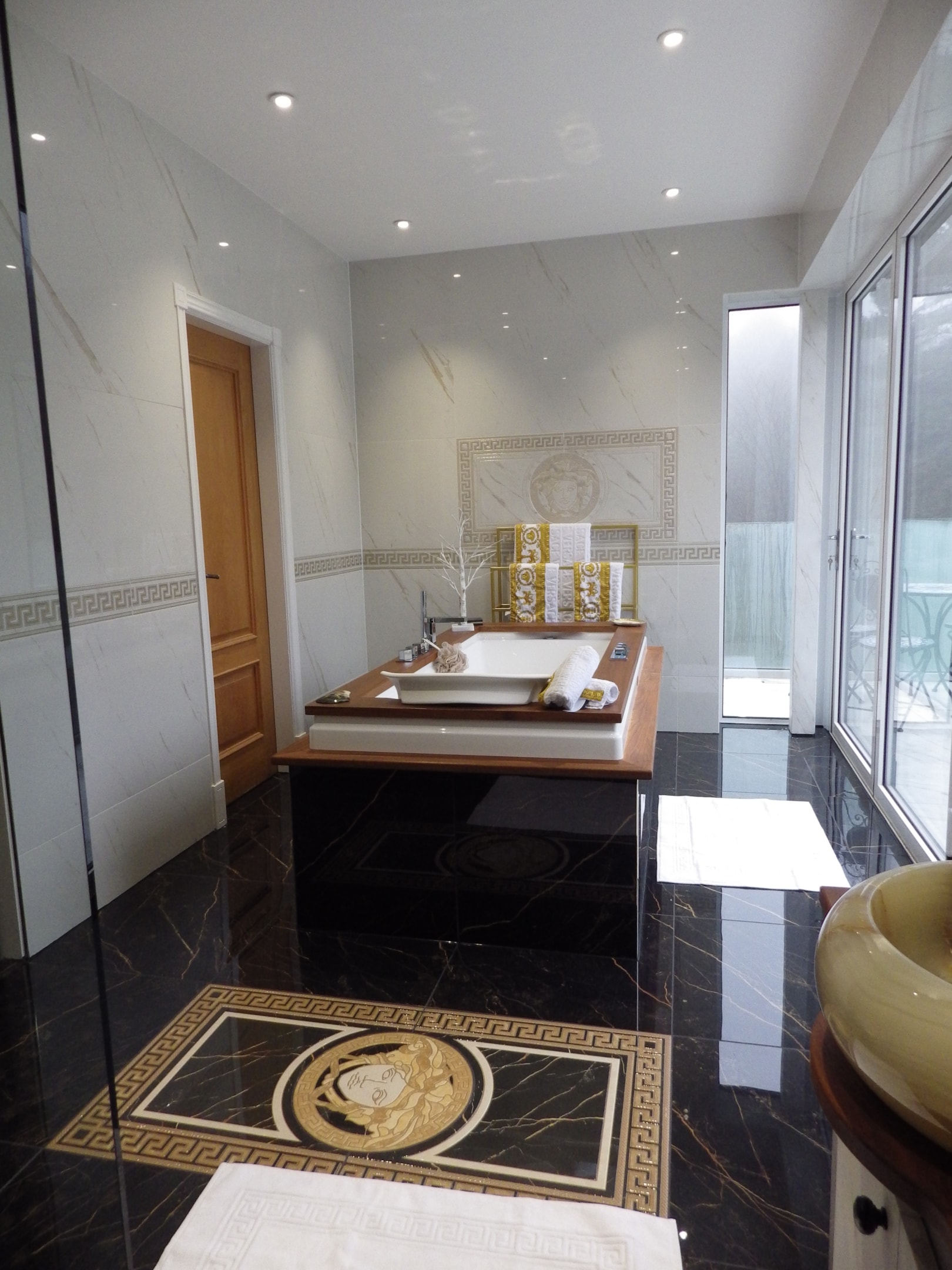 “Just as Gianni Versace was once driven by contemporary culture, this project reflects modern elegance through floor-to-ceiling light, hand-mitred corners, and timeless decorative elements.”