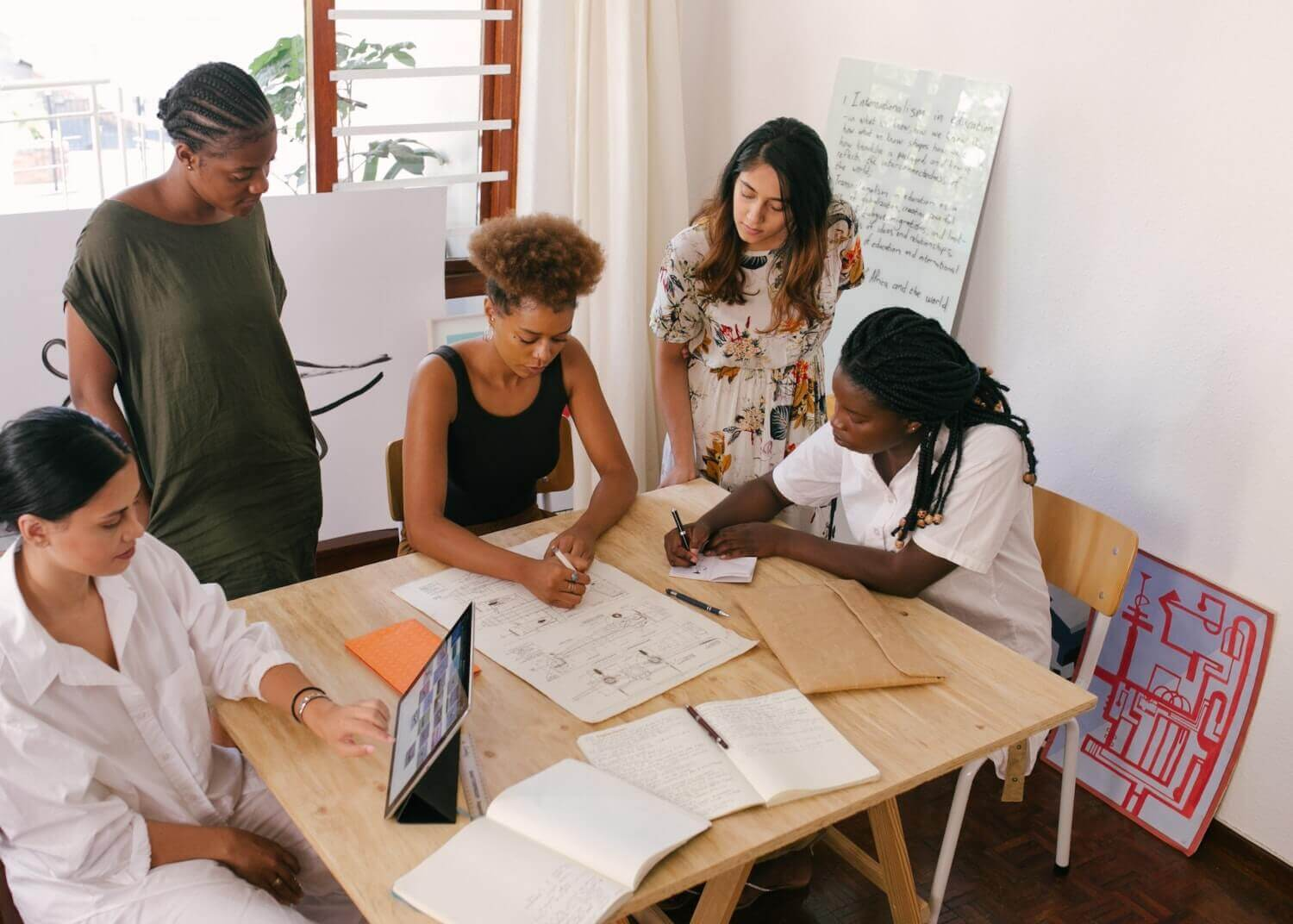 group of women discussing small business tips