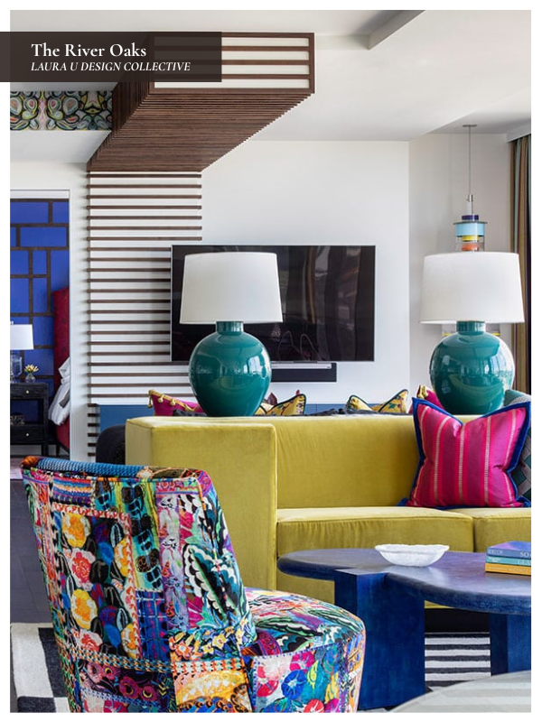 Colorful high-rise living room with a citrine velvet sofa, cobalt coffee table, patterned upholstery, and vibrant accent pillows.