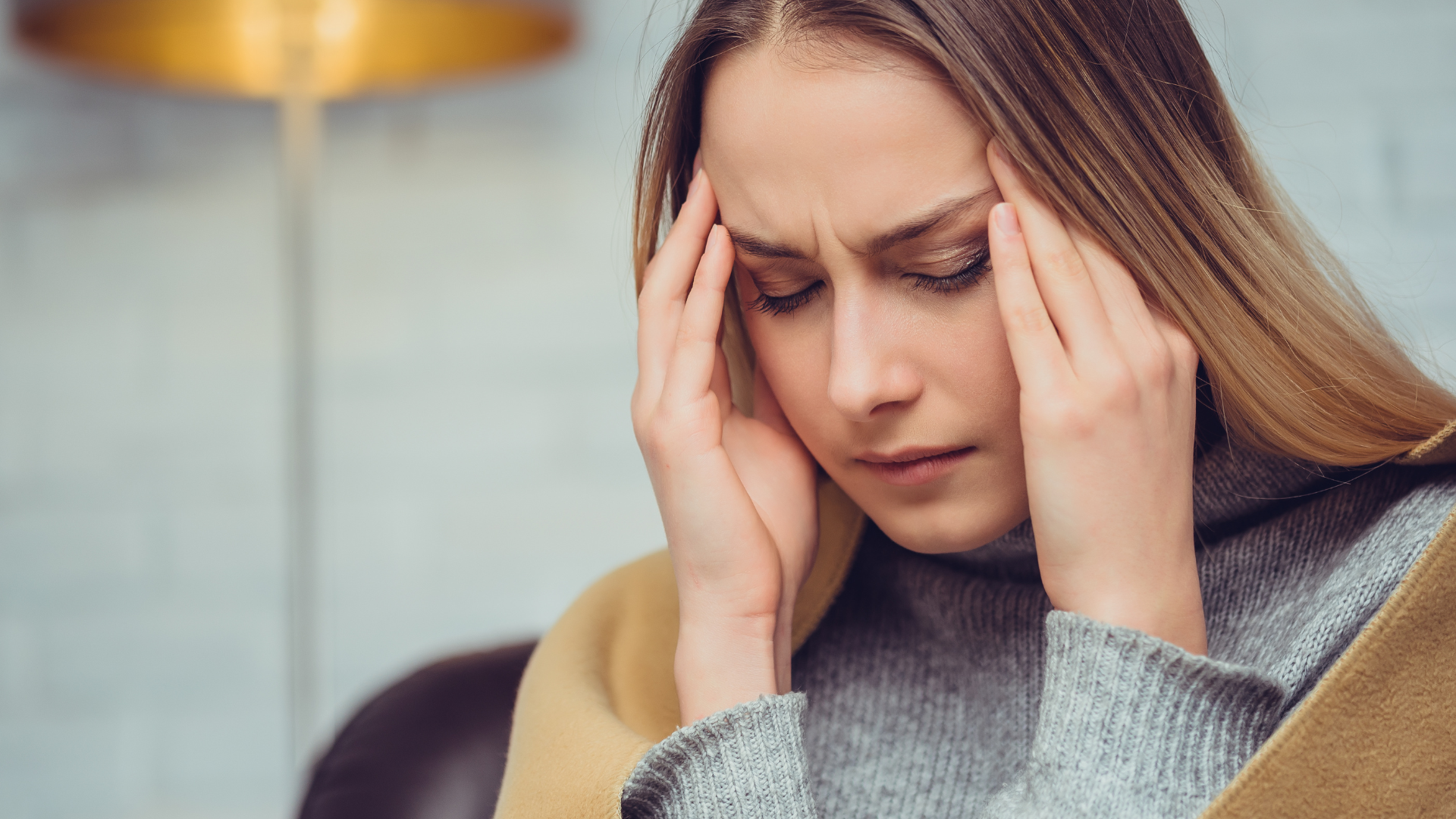 Woman suffering from a headache