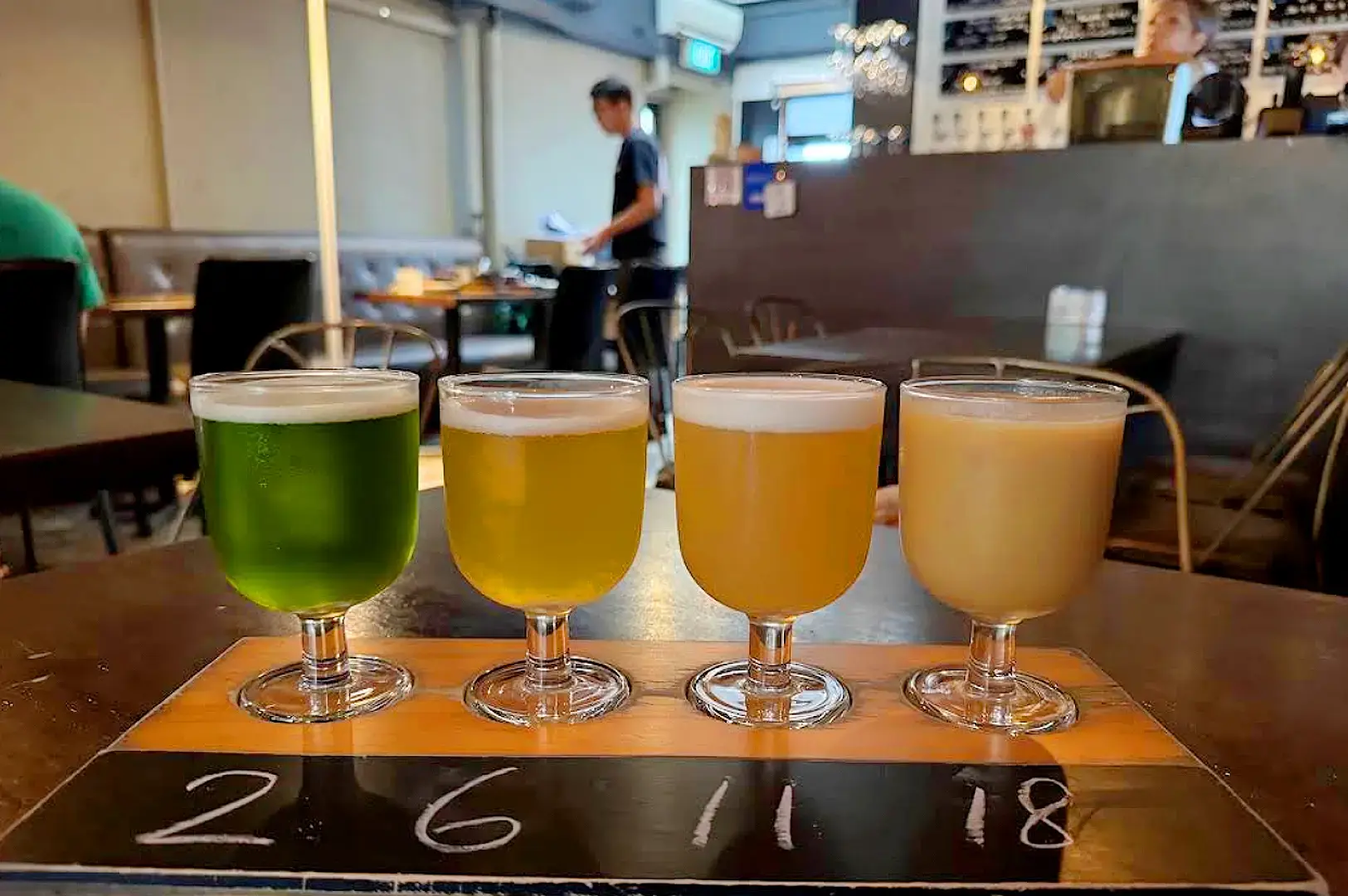 SG Taps Singapore craft beer tasting flight featuring four beers