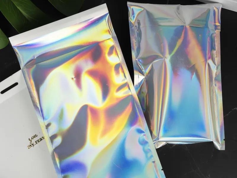 Two laser shipping bags placed against a black background, creating a sleek and modern visual. 