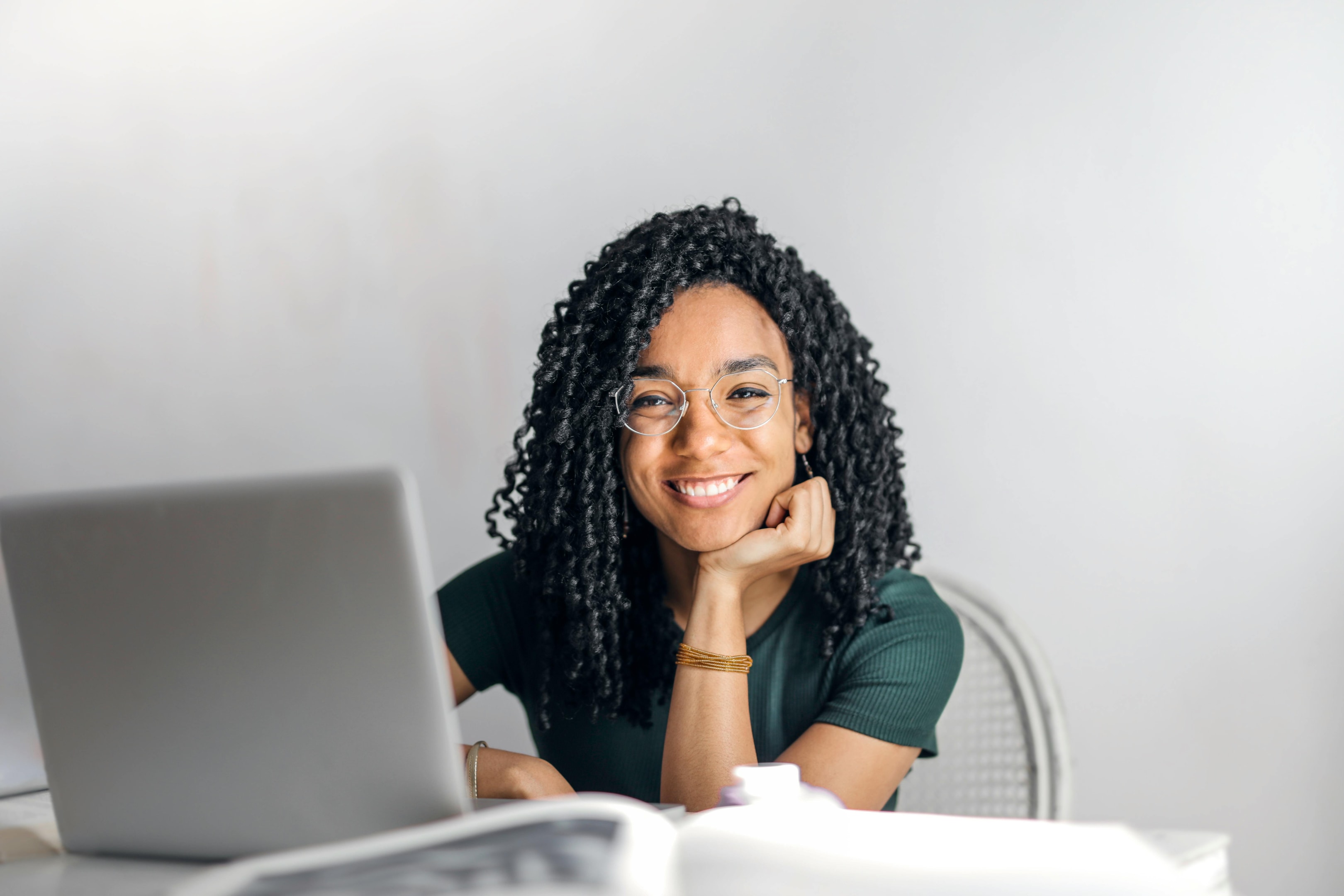 Financially independent woman grinning happily