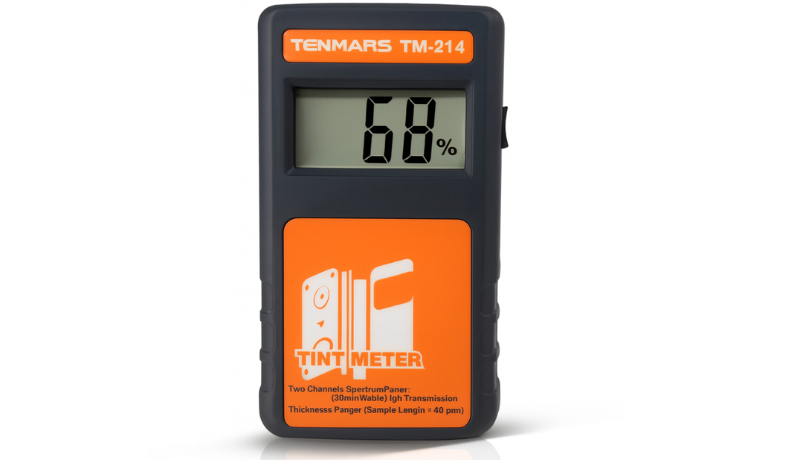 Professionals use tint meter to asses reflective window tint manufacturer's AS 1 line for tint job