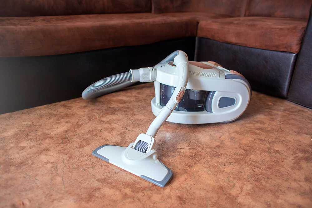 Before you deep clean linoleum floors, remove loose dirt and debris using a vacuum cleaner first