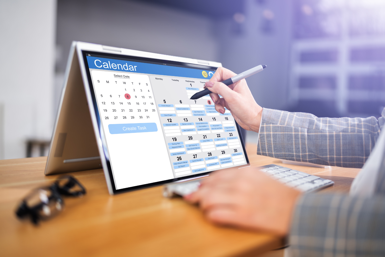 A tab showing a digital calendar for deadlines.