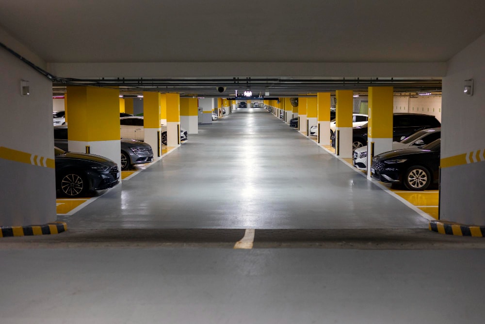 A basement garage parking lot needs security professionals to implement security controls and address security threats.