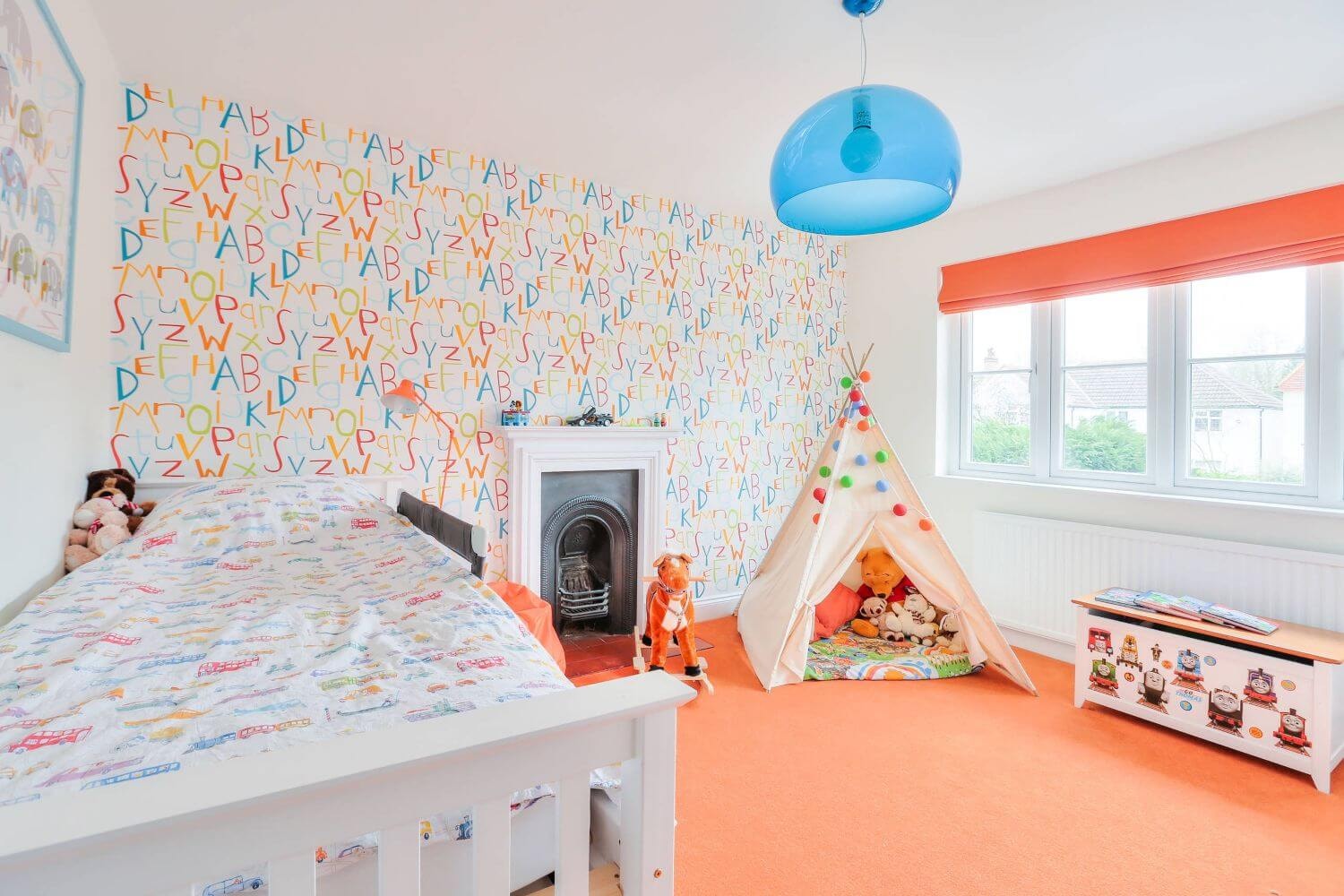 A vibrant toddler room, featuring playful kids decor, and inviting colours that spark creativity and imagination. 