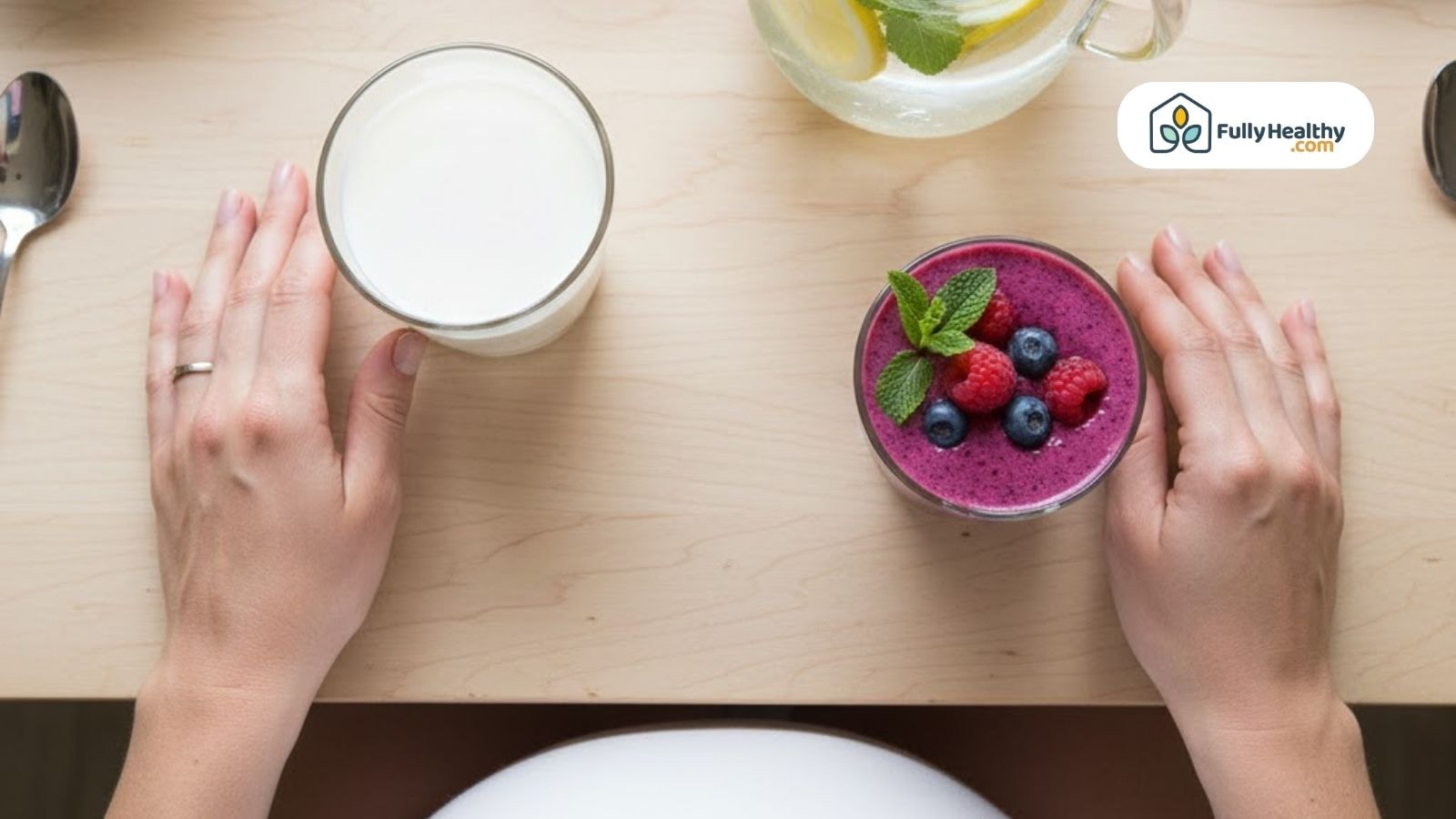 Top-down view of a pregnancy-friendly breakfast setup with a smoothie and milk.