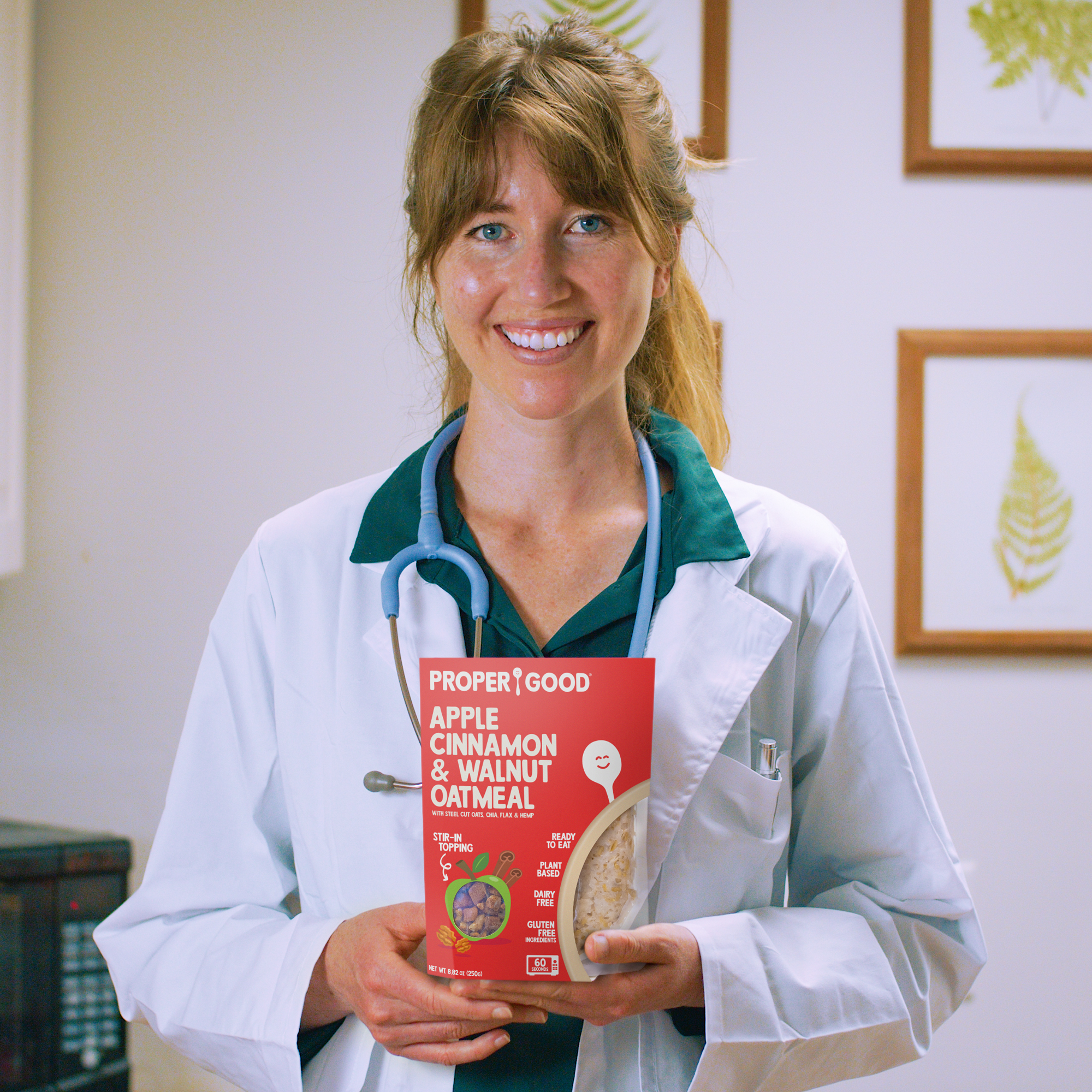 Medical staff displaying Proper Good's Apple Cinnamon & Walnut Oatmeal in a break room