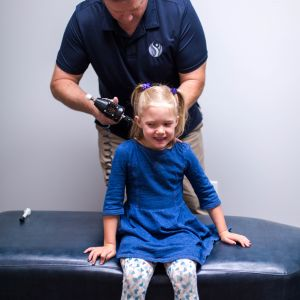 specific adjustment using Arthrostim on girl