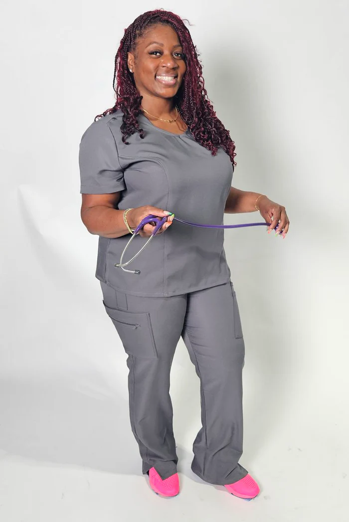 The best plus size scrub tops don't all have to look the same, check out this fitted yoke front