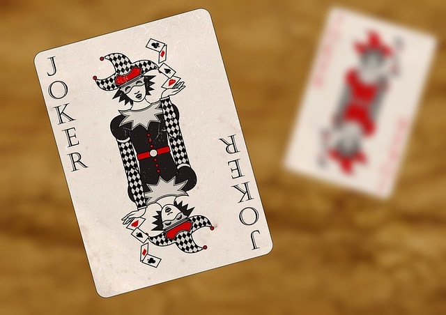 playing cards, joker, red