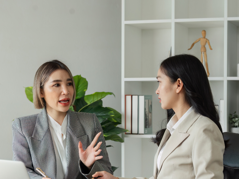 Image of a person happy after talking with a client.