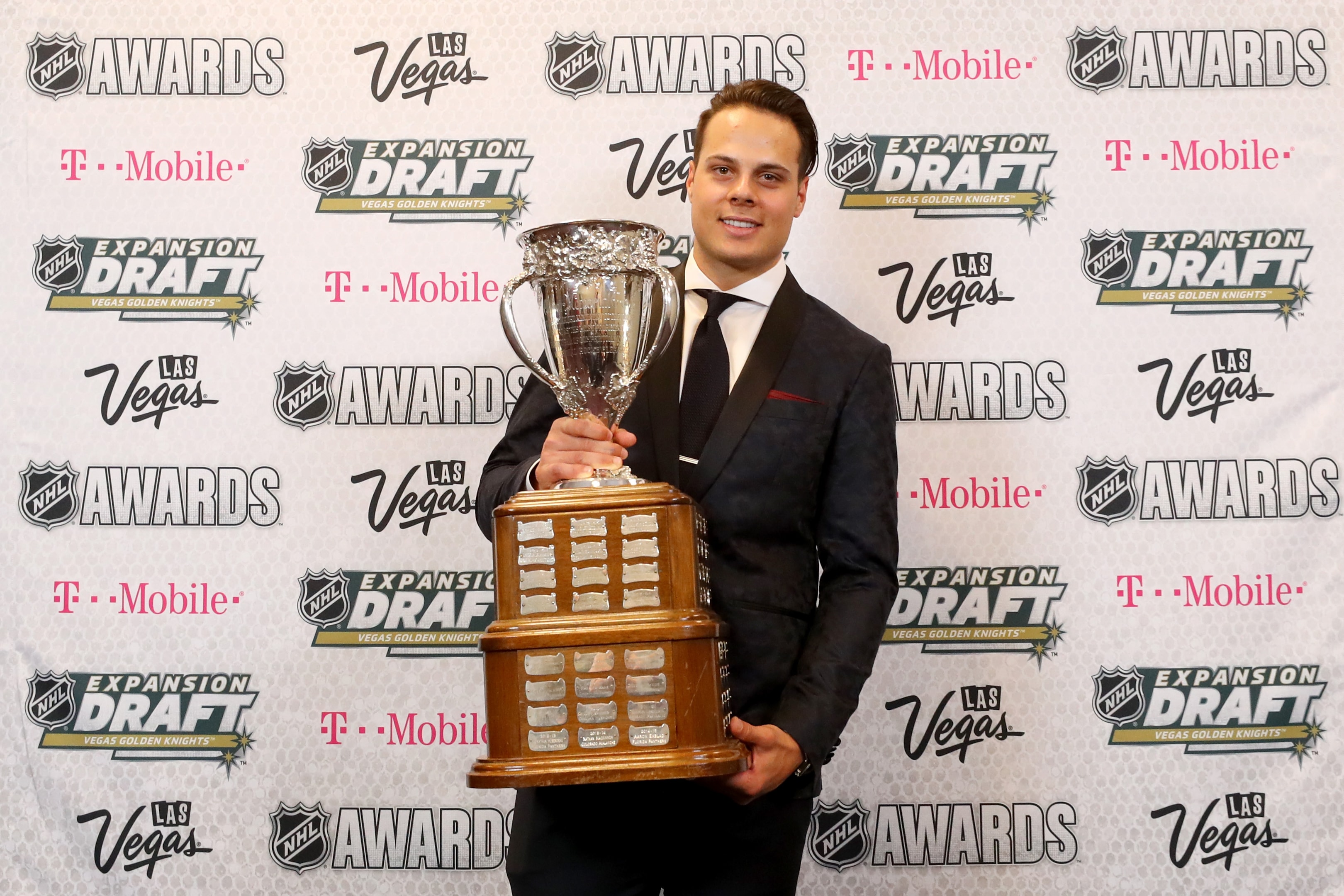 Auston Matthews of the Toronto Maple Leafs poses after winning the Calder Trophy (Rookie of the Year) during the 2017 NHL Awards and Expansion Draft at T-Mobile Arena on June 21, 2017 in Las Vegas, Nevada. 