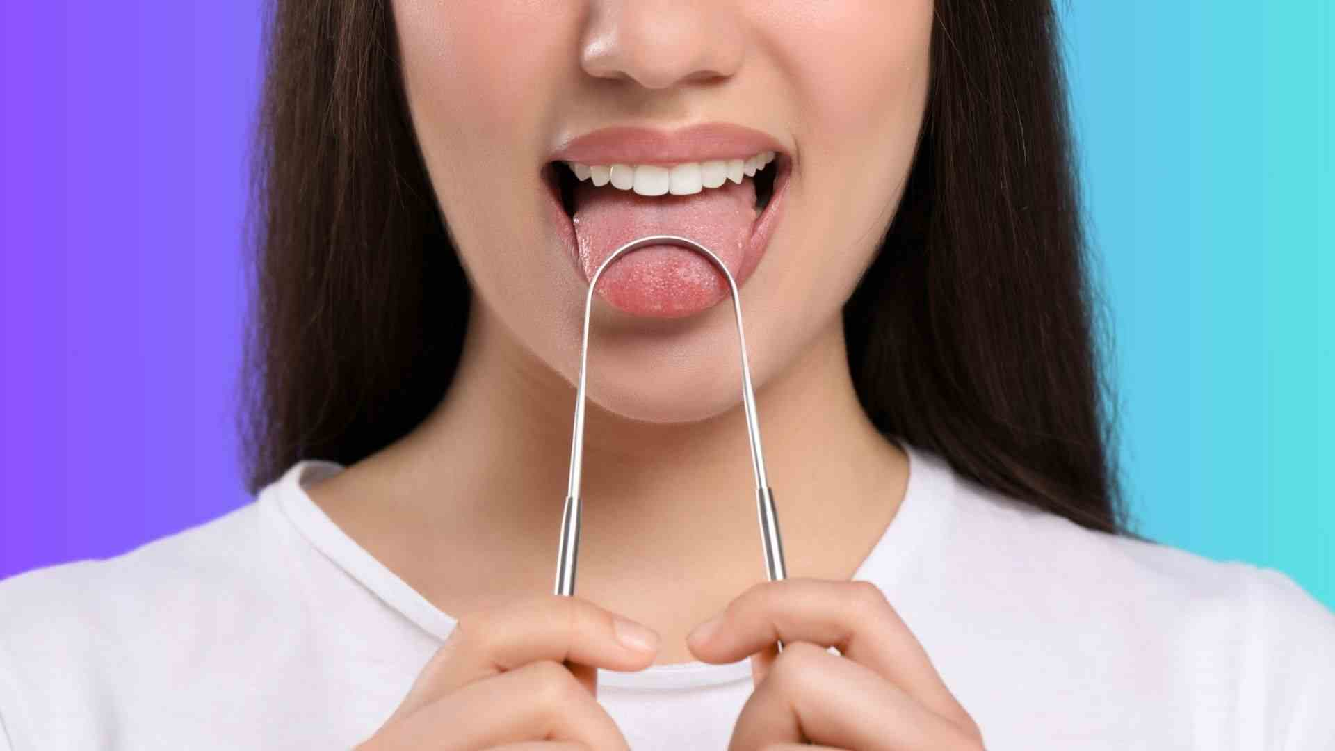 A woman using tongue scraper