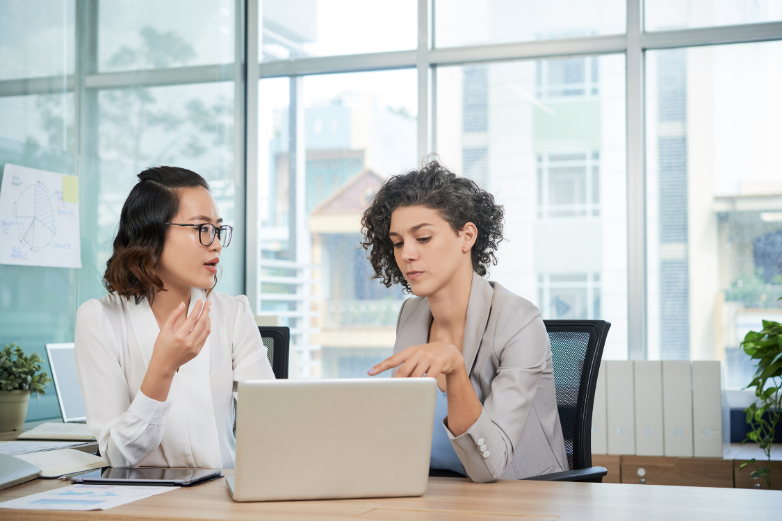 Procurement and operations team reviewing supplement manufacturer performance criteria