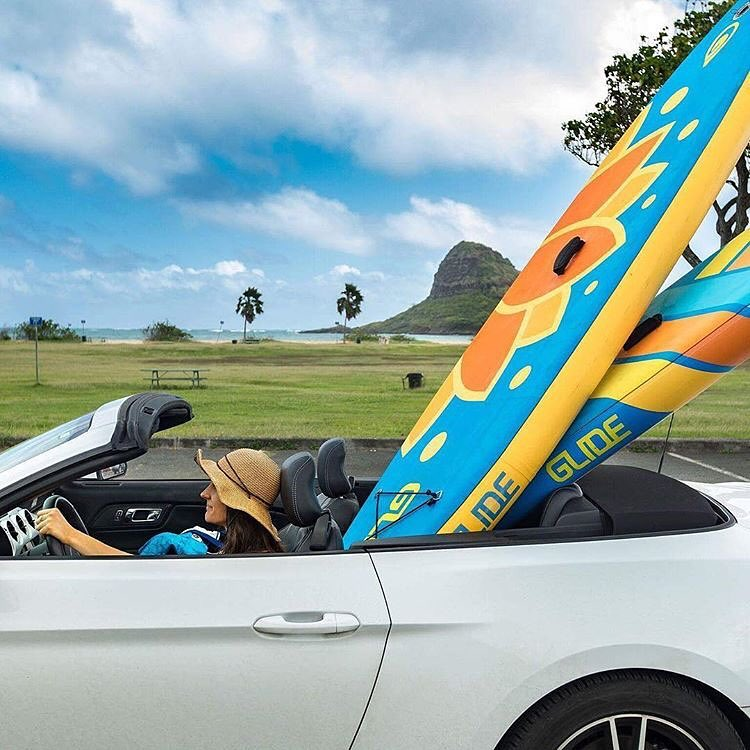inflatable paddle boards in a convertible
