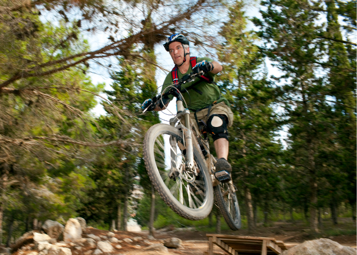 A mountain biker mastering essential mountain biking skills