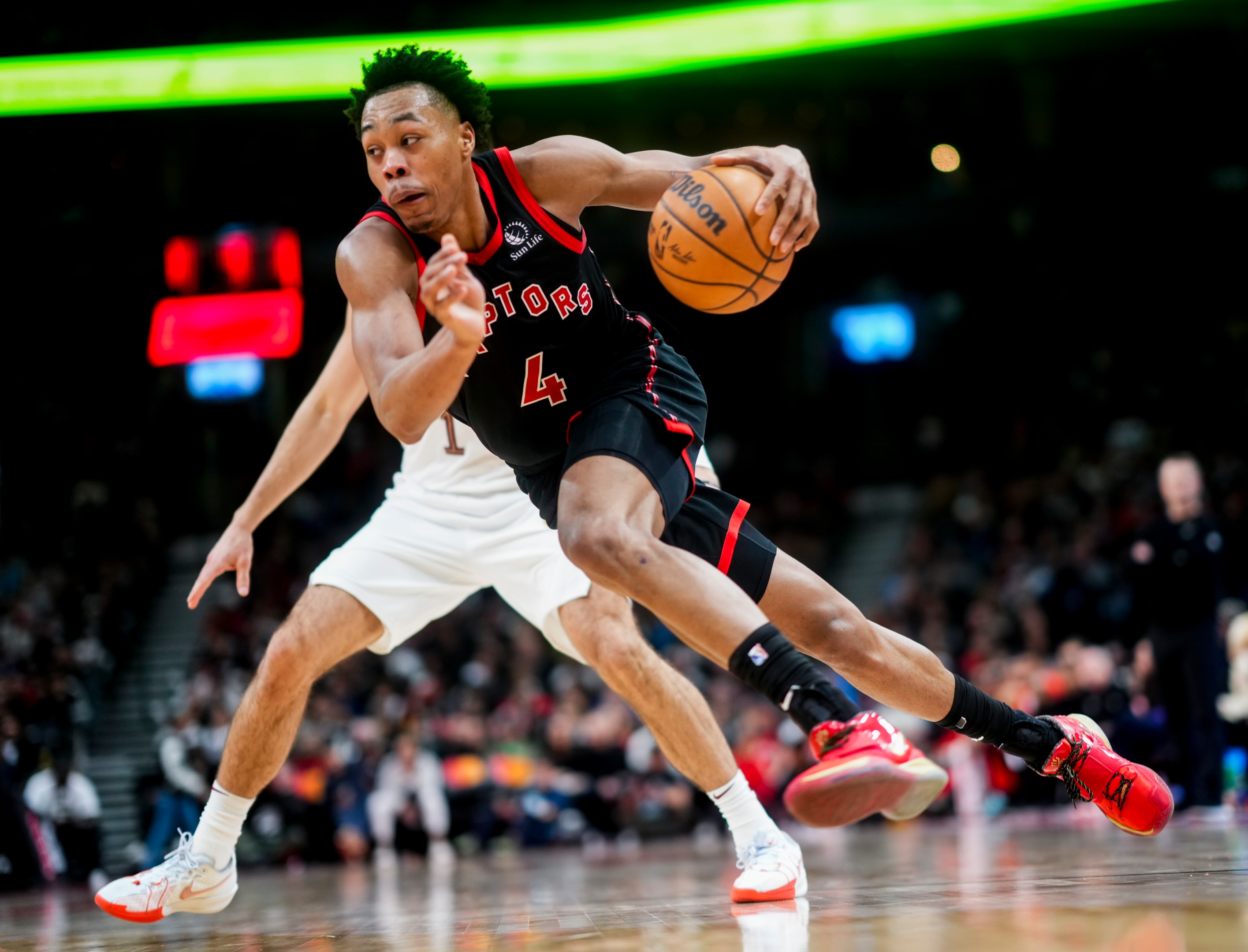 Scottie Barnes of the Toronto Raptors drives against the Cleveland Cavaliers during the second half of the game at the Scotiabank Arena on February 10, 2024 in Toronto, Ontario, Canada.