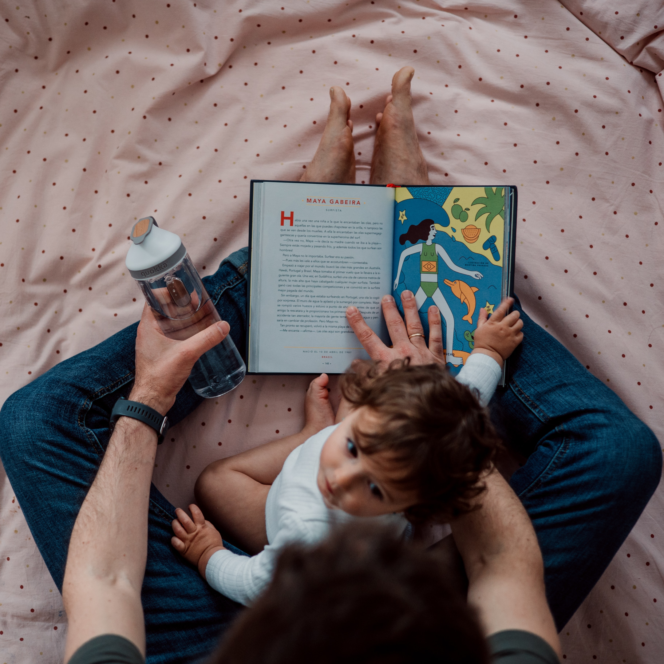 father reading to child