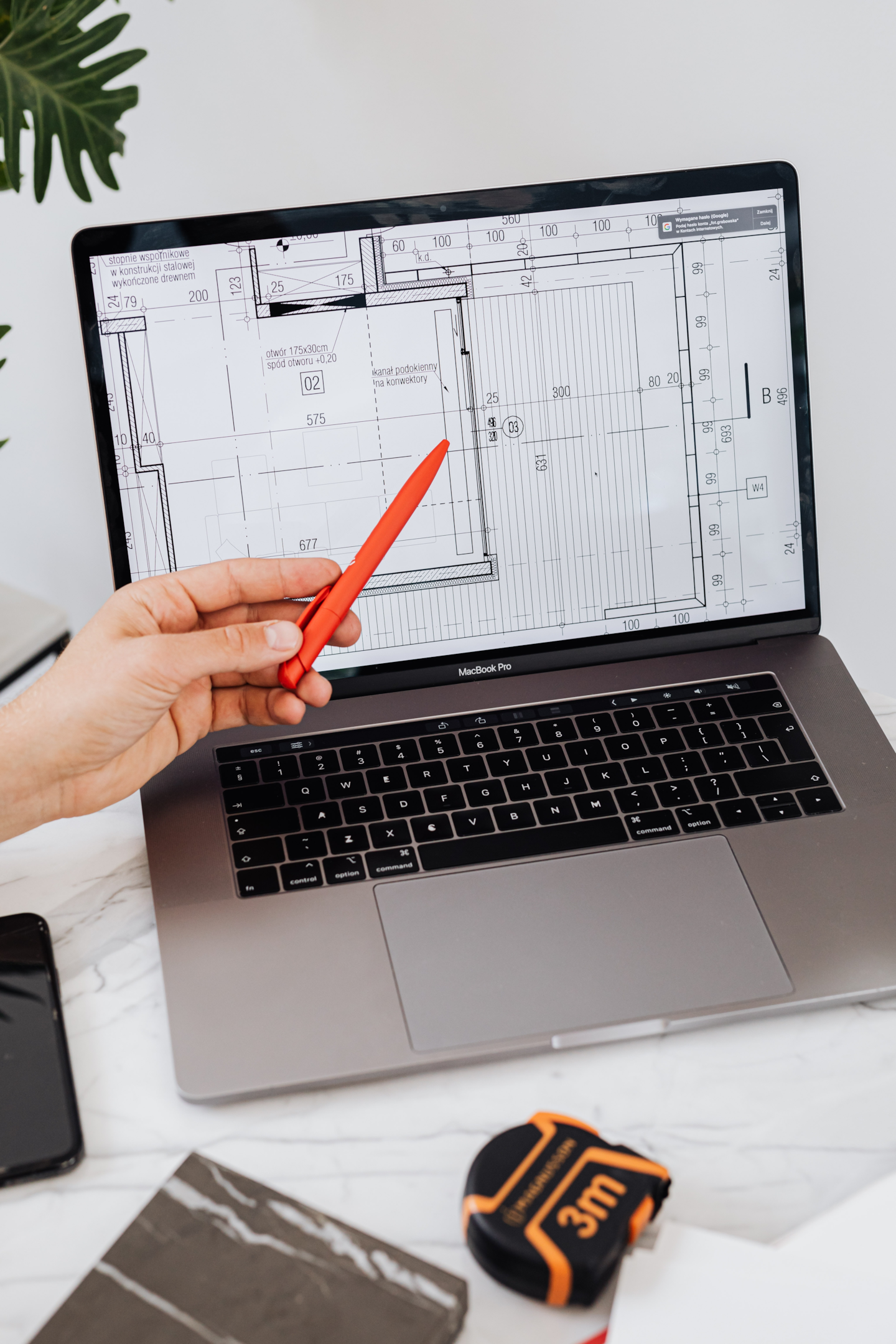 Laptop presenting floor plan.