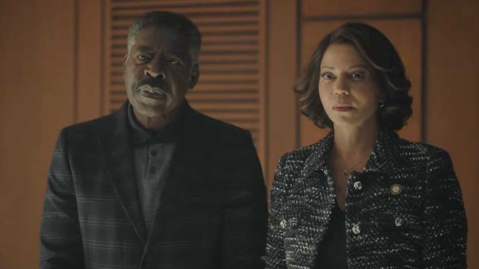 Ernie Hudson as Reverend Edwin Peters and Gloria Reuben as Mae Silver in Boston Blue