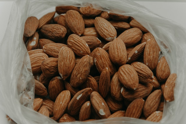 almonds are a great source of vitamin E and you can also opt for vitamin e capsule for hair