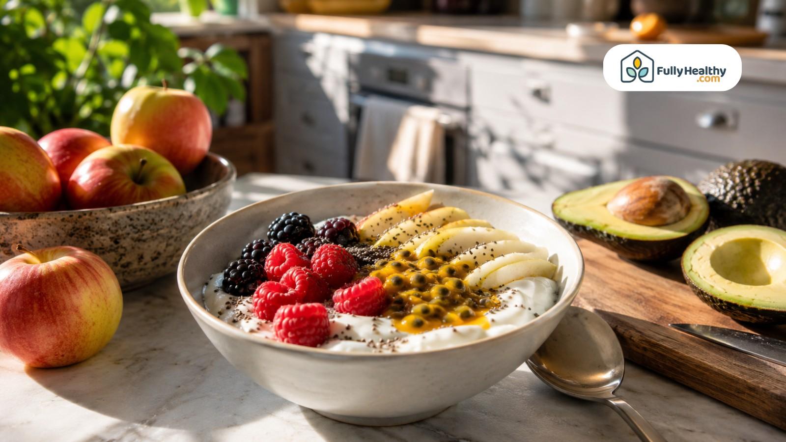 Greek yogurt topped with passion fruit, berries, apple slices, chia, and avocado