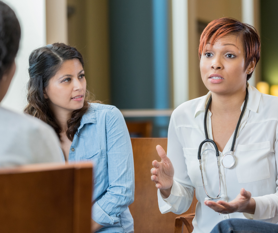 A healthcare professional assessing a patient for alcohol use disorder