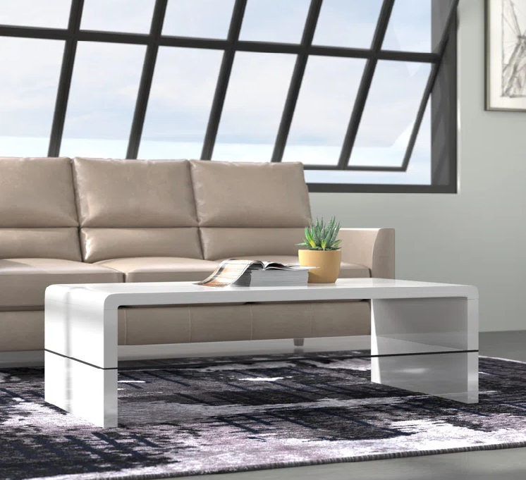 white waterfall edge coffee table with lower tempered glass shelf