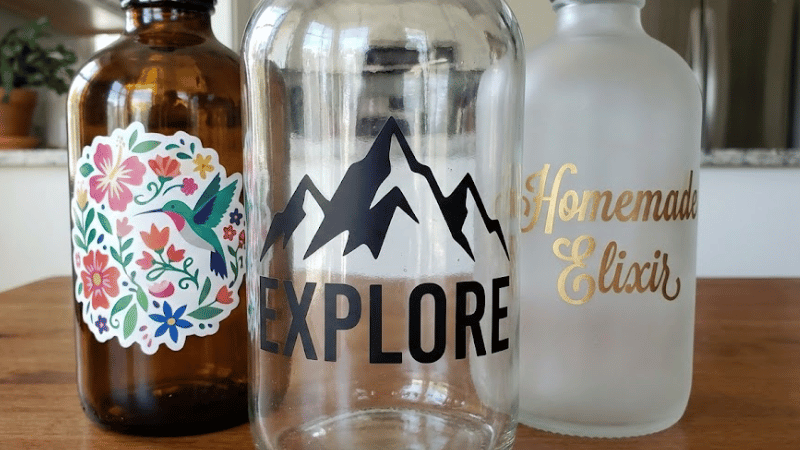 Adhesive vinyl decals on the bottles