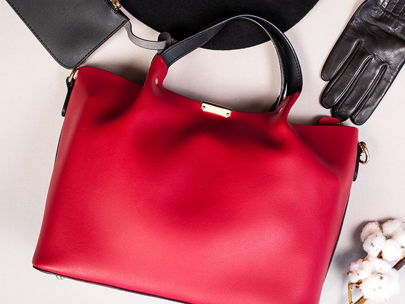 Red tote bag made from synthetic leather