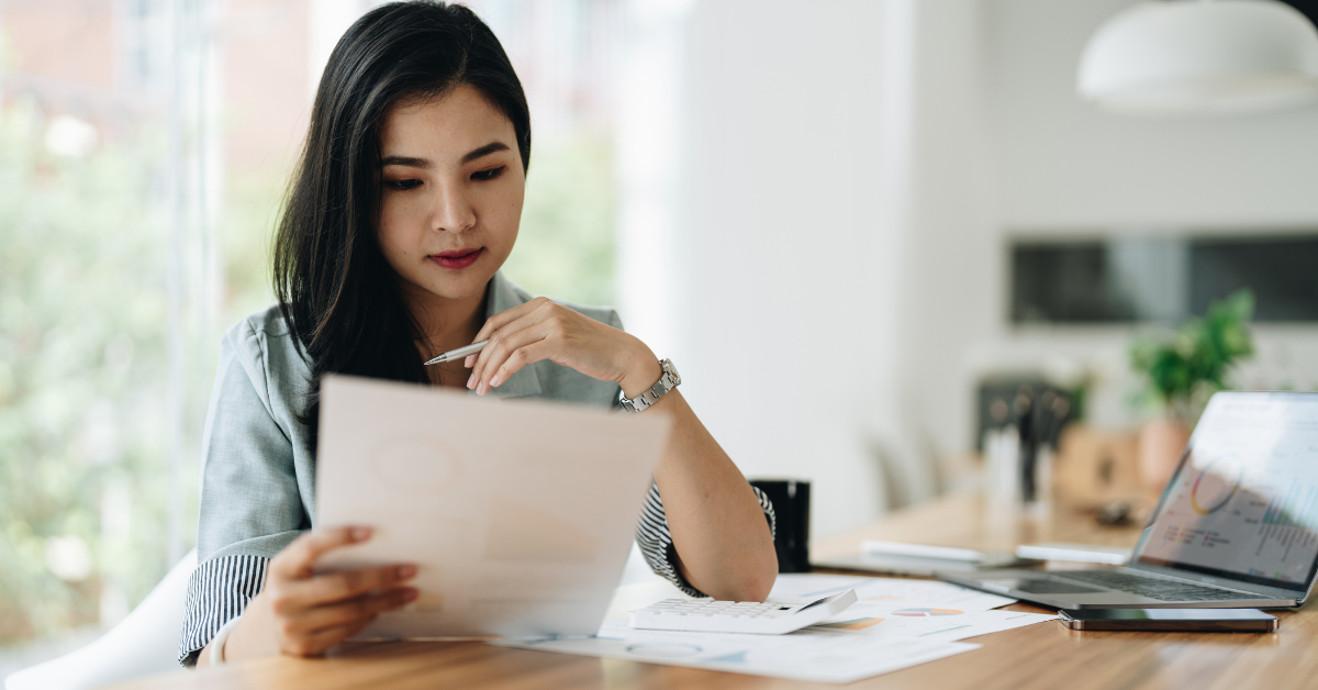 A woman checks if are tips taxable on her OnlyFans account and how to manage taxes