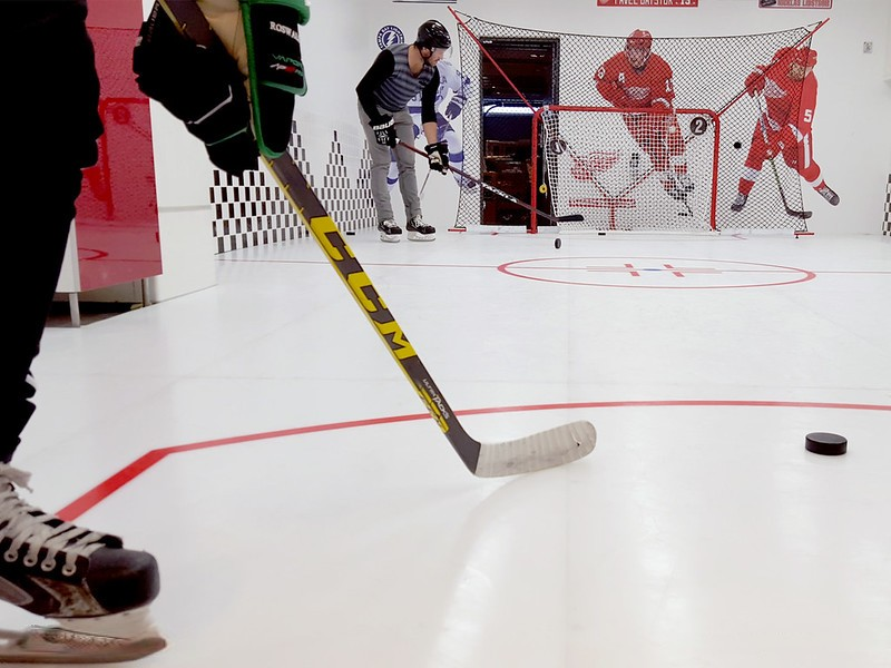 Hockey stick on synthetic ice