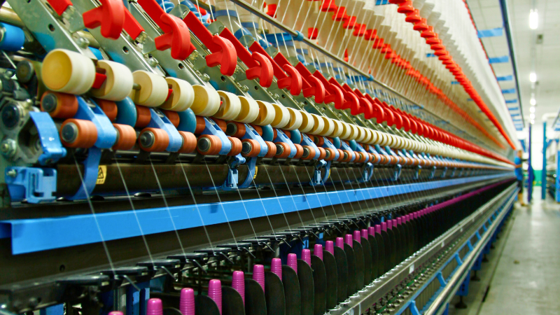 An image of a spinning machine in a fabric supplier factory