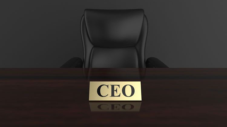 image shows an office chair and table tag with the word "CEO".