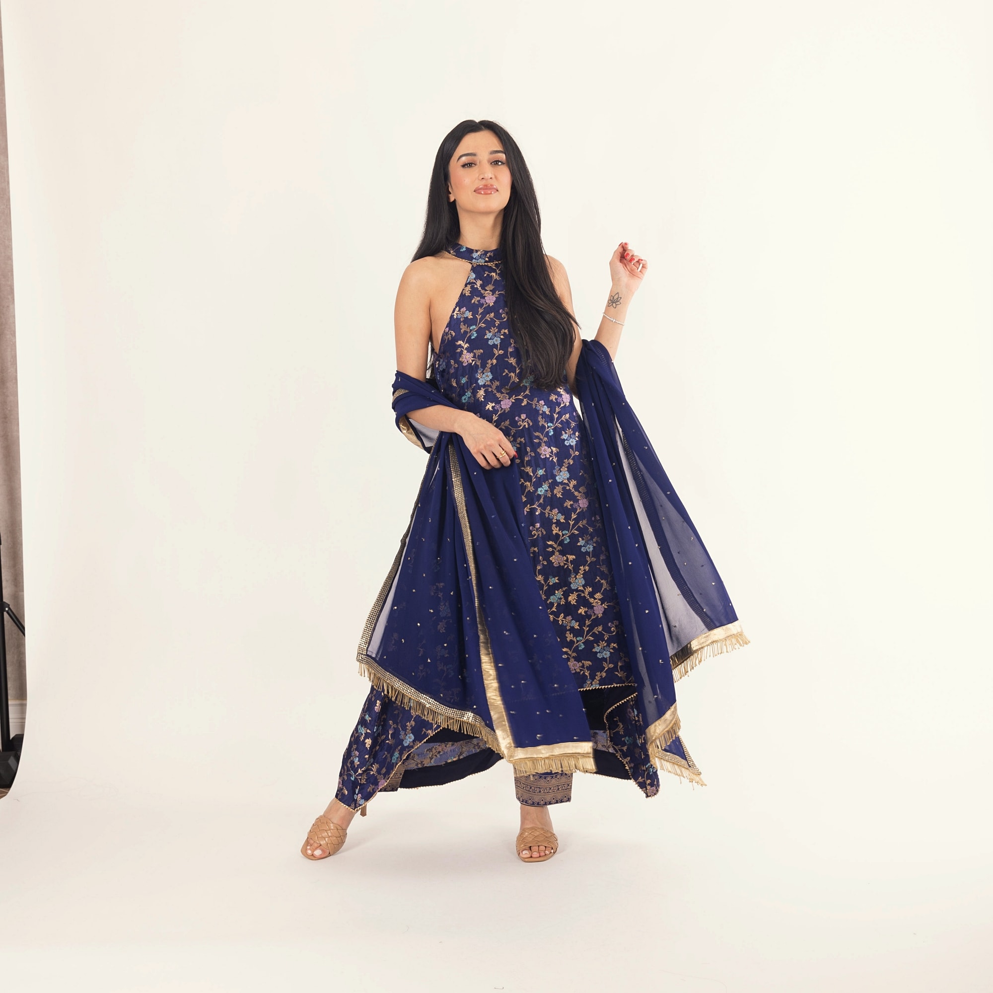 An elegant display of traditional salwar kameez showcasing its rich history.