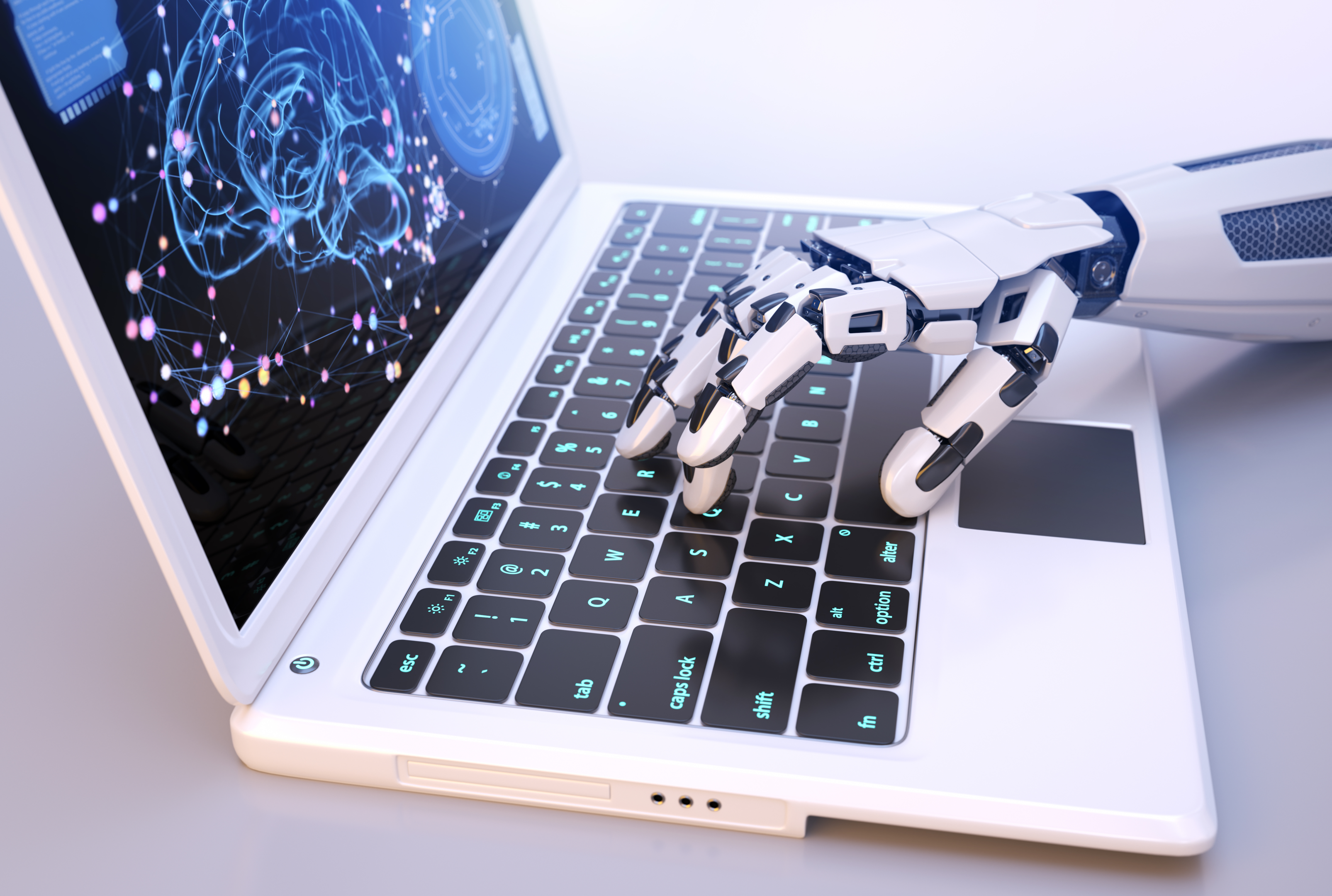 Robot typing on laptop